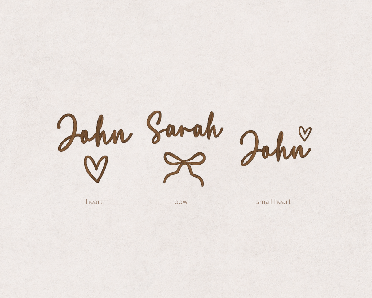 Personalised baby embroidery design options showing a custom name with a heart, bow or small heart
