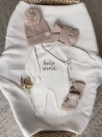 Personalised Hello World baby wrap romper with beige knitted hat, baby booties and headbow