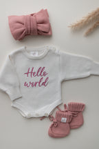 Personalised ivory baby romper with pink embroidery, matching knitted headband and booties
