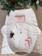 Personalised Christmas wrap romper with name and mistletoe design, light pink headbow and baby booties
