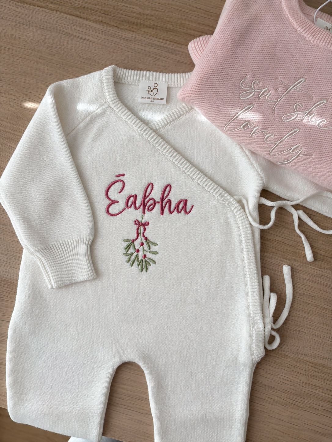Personalised Christmas wrap romper with name and mistletoe design